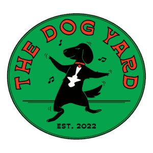 The Dog Yard Logo in Black and Red with a green background